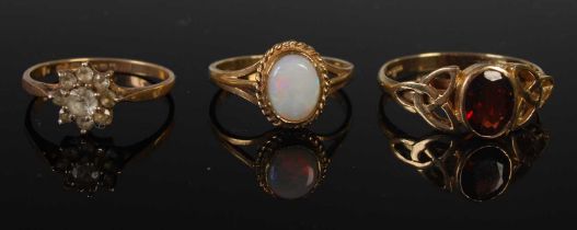 Three assorted 9ct gold gem set rings, gross weight 5.8 grams.