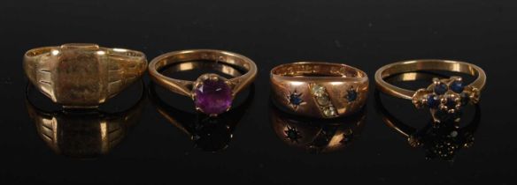 A group of four 9ct gold rings to include a signet ring and three assorted gem set rings, gross