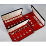 A cased set of six 20th century silver thistle topped teaspoons, Birmingham, 1975, together with a