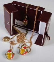 Sarah Faberge - A gilt metal, enamel and paste set egg-shaped pendant and chain, together with a