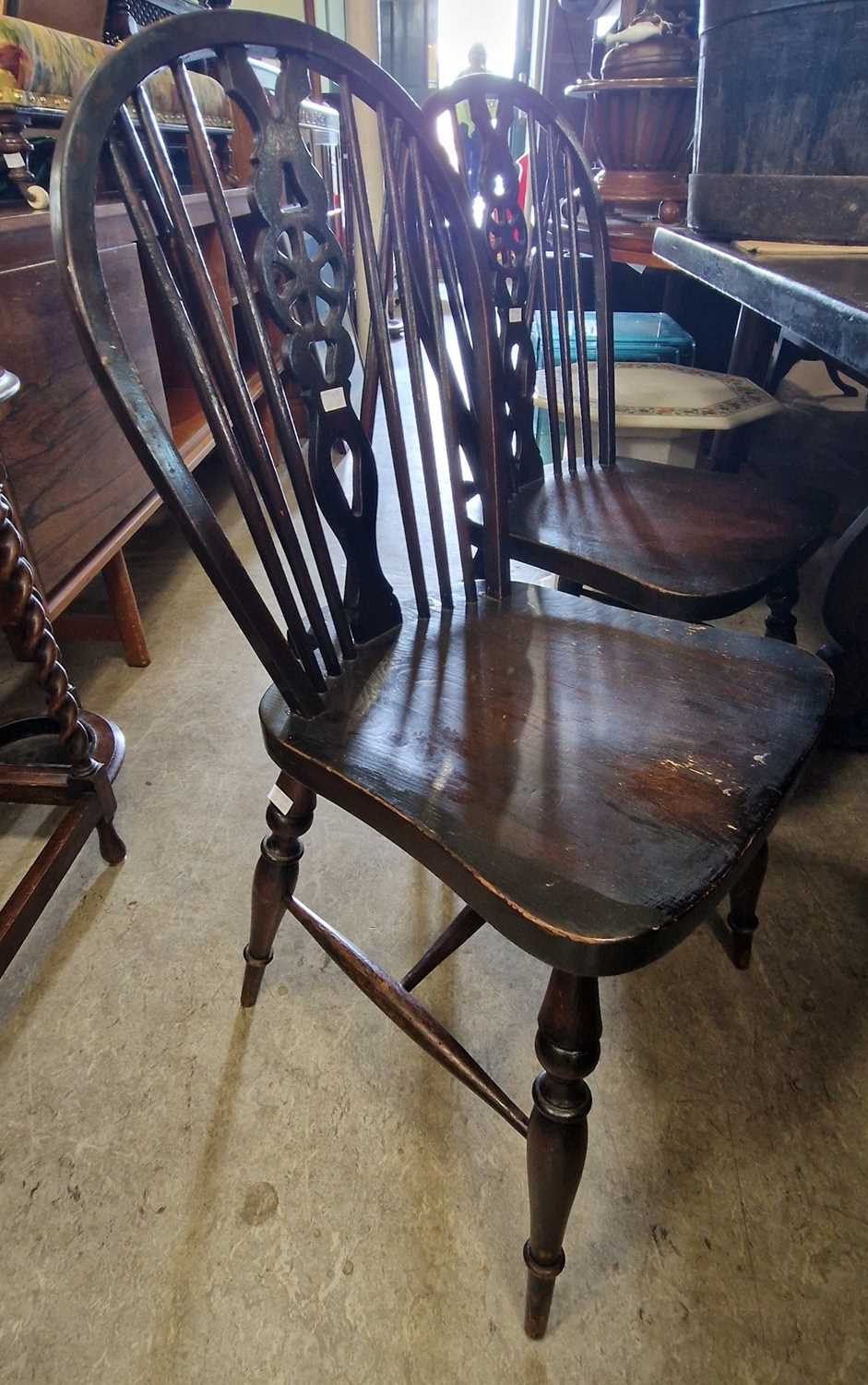 A 20th century dining room suite comprising sideboard, refectory table, and six spindle back side - Image 2 of 3