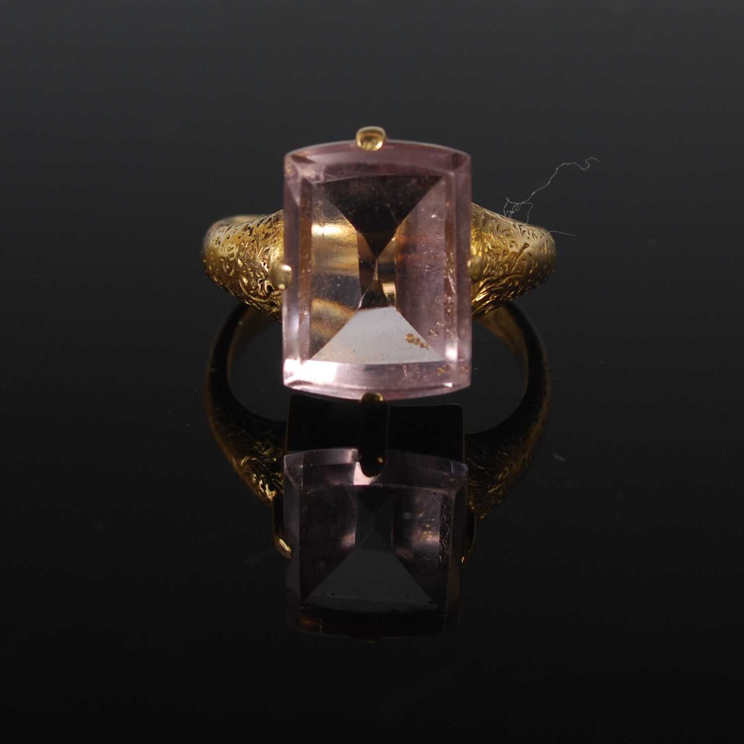 A late 19th century yellow metal and pale amethyst single stone ring stamped 18C, ring size J.