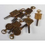 Eight assorted antique pocket watch keys.