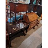 A group of furniture to include a late Victorian walnut and marquetry inlaid davenport; an early