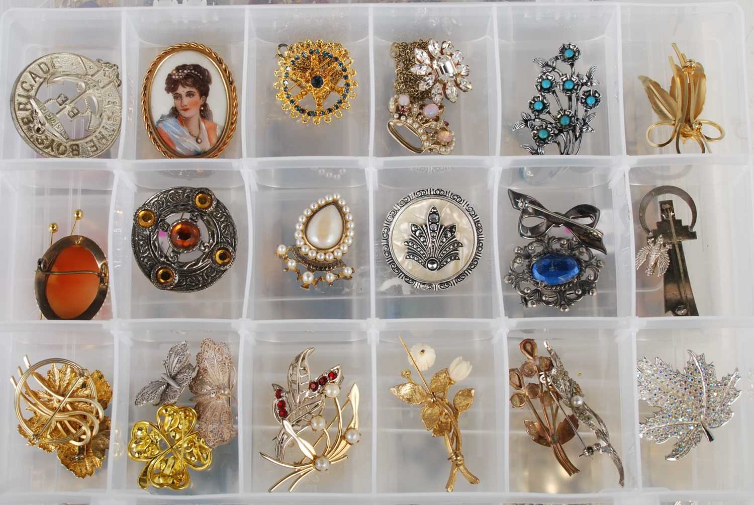 Three boxes of assorted costume jewellery to include brooches, necklaces, pendants etc. - Image 3 of 4