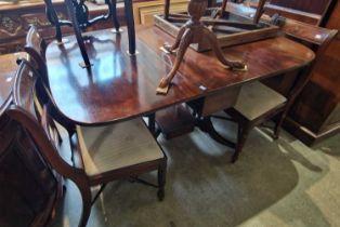 A set of four 19th century mahogany dining chairs with drop-in upholstered seats together with an