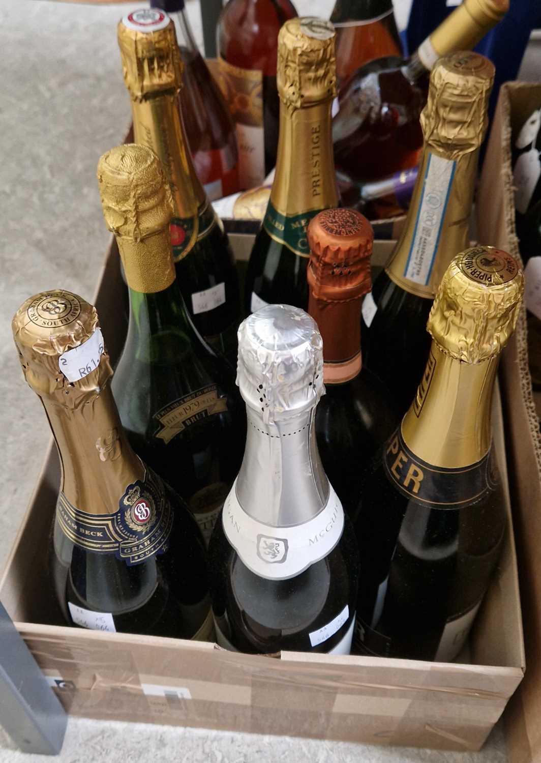 Eight bottles of wine to include McGuigan sparkling brut 75cl; a Piper-Heidsieck champagne brut