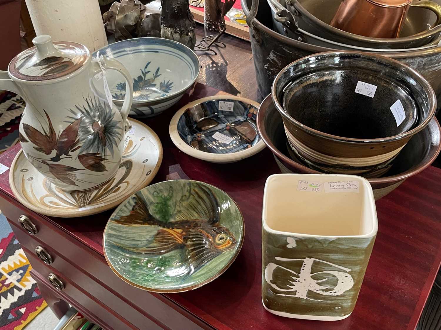 A collection of Studio Pottery to include a Puigdemont plate decorated with a fish; a Buchan bowl