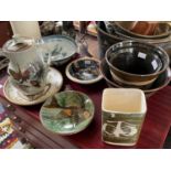 A collection of Studio Pottery to include a Puigdemont plate decorated with a fish; a Buchan bowl