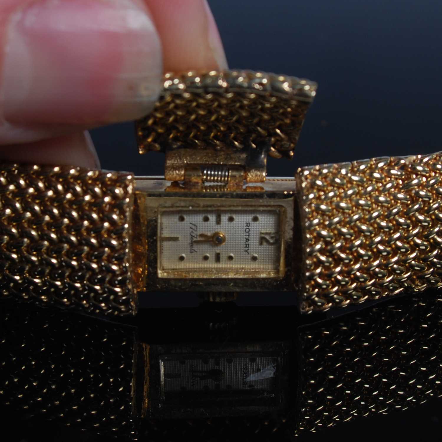 A vintage ladies yellow metal Rotary bracelet wristwatch stamped '14k', the dial with hinged - Image 4 of 4