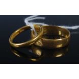 Two 22ct gold wedding rings, gross weight 7.7 grams (2).