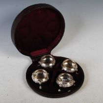 A cased set of four Victoria silver salts, London, 1875, makers mark of R H for Robert Hennell, with