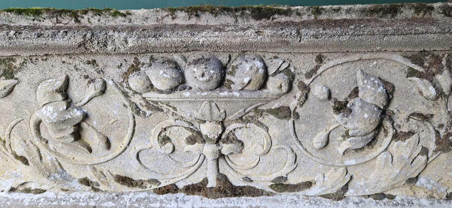 A composite stone garden planter, the rectangular planter moulded in relief with urn, fruit, flowers - Image 2 of 3