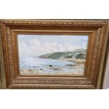 A Gilt framed print of a Coastal beach scene, 41cm x 25.5cm, framed and glazed 57cm x 41.5cm