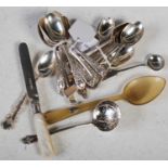 A collection of assorted silver to include twelve London silver coffee spoons, six Sheffield