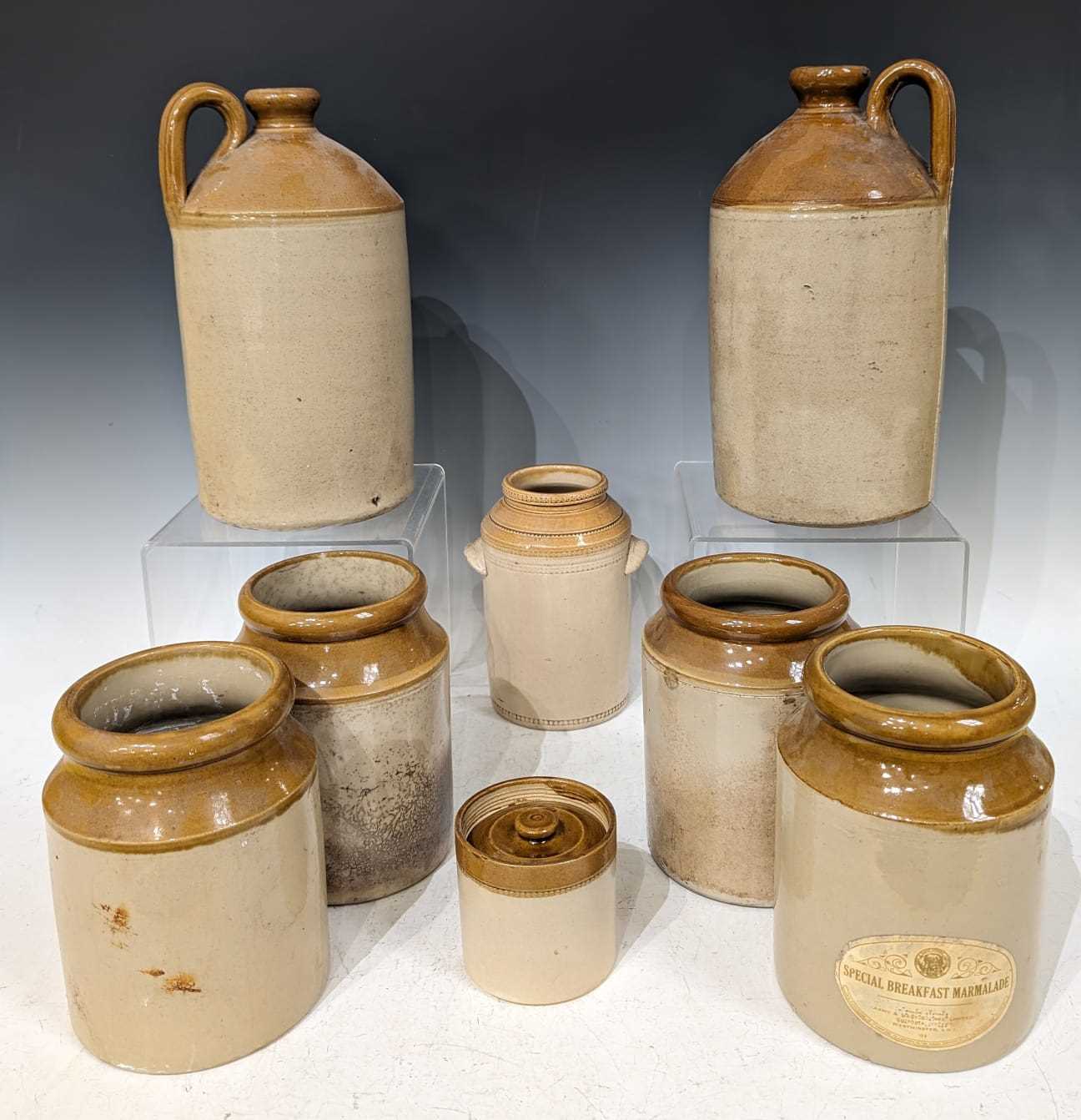A collection of late 19th/early 20th century stoneware comprising four stoneware jars, one with a