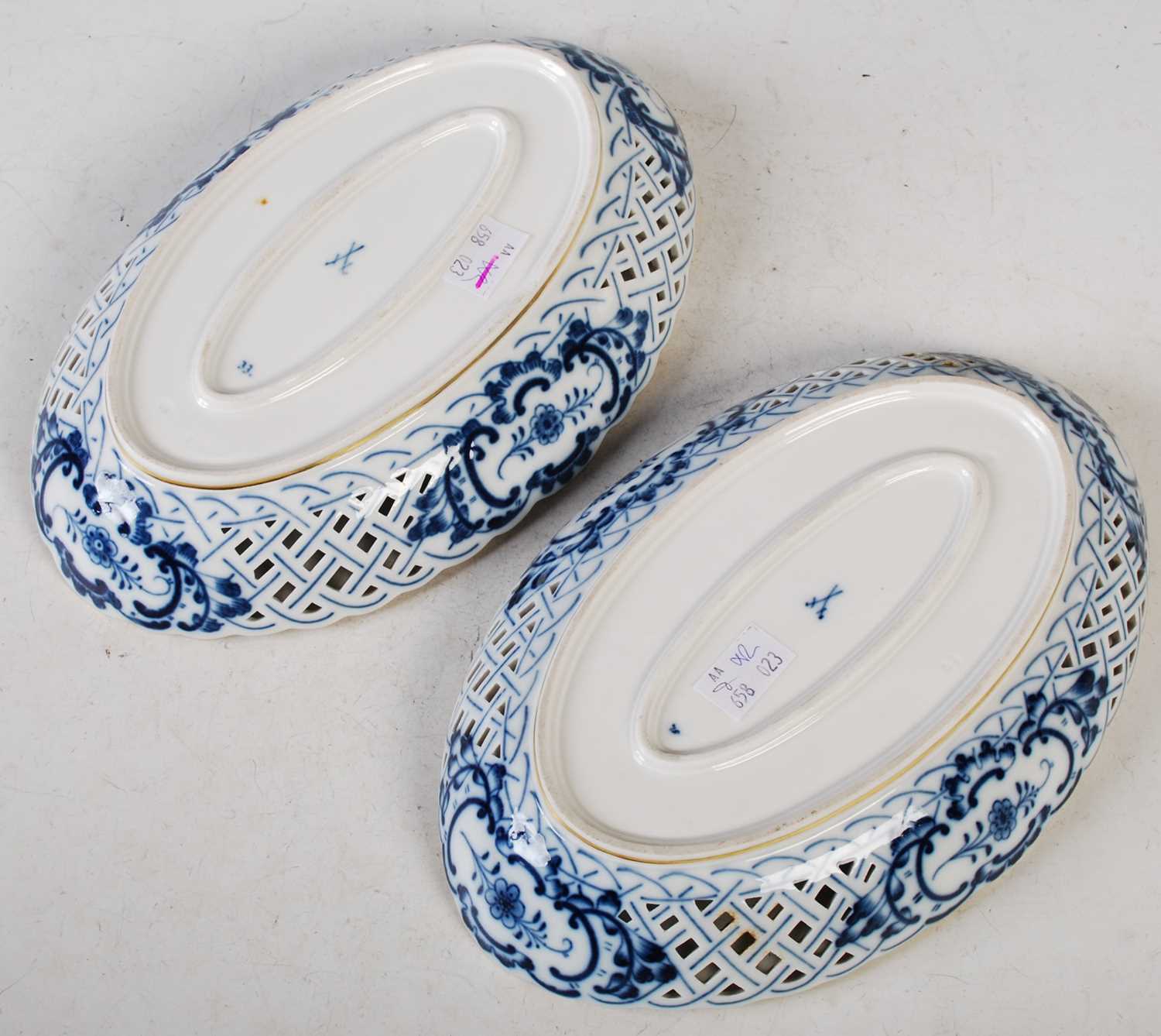 A pair of Meissen porcelain, blue and white onion pattern oval shaped dishes, with pierced rims - Image 2 of 3