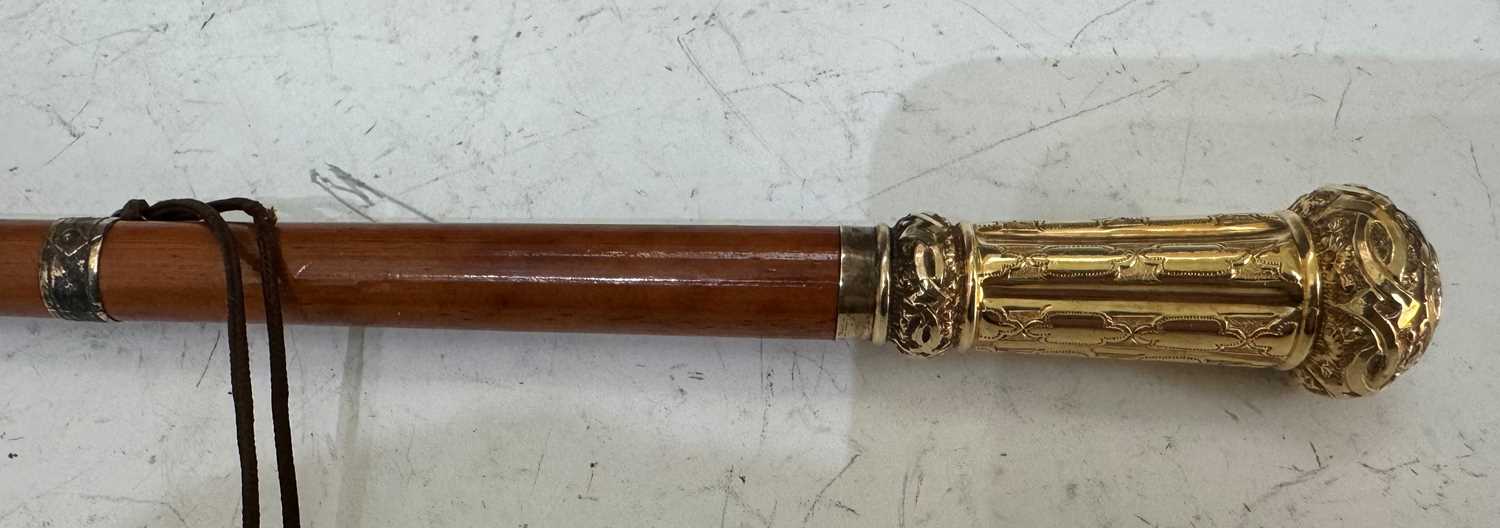 A late 19th Century Malacca riding crop with detailed gilt handle, the top inscribed 'G. Gregory', - Image 3 of 4
