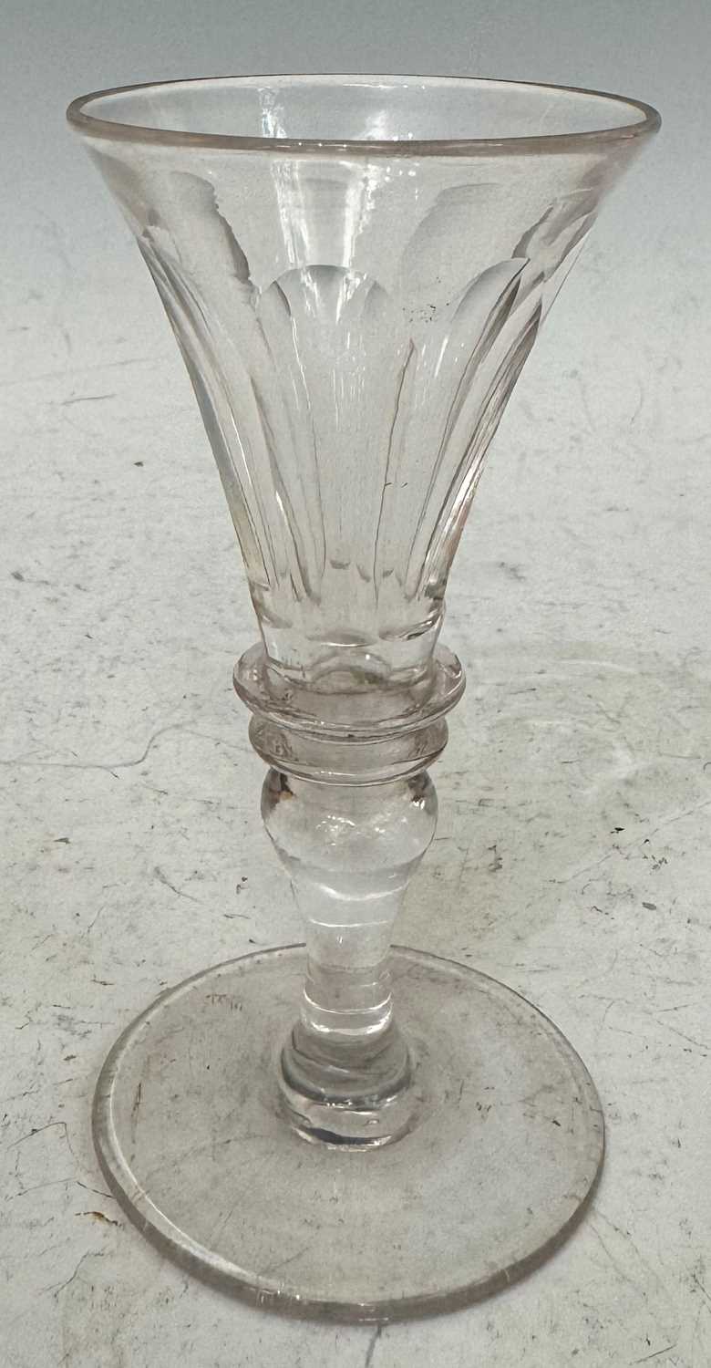 A 19th Century facet cut liqueur glass, 12.5cm high.