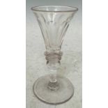 A 19th Century facet cut liqueur glass, 12.5cm high.