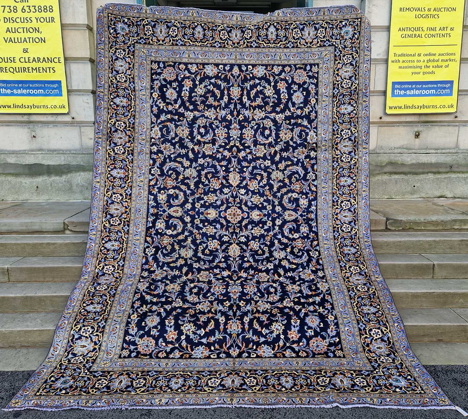 A Persian Isfahan carpet, 20th century, the rectangular blue ground field decorated with all-over - Image 2 of 8