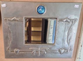 An early 20th century Arts & Crafts pewter framed wall mirror, the frame embossed with butterfly and