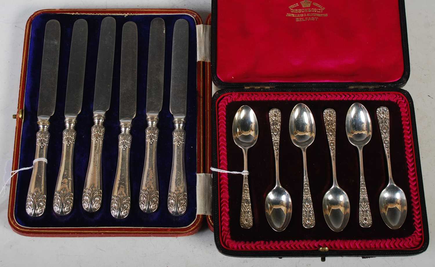 A cased set of six London silver teaspoons together with a cased set of six Sheffield silver handled