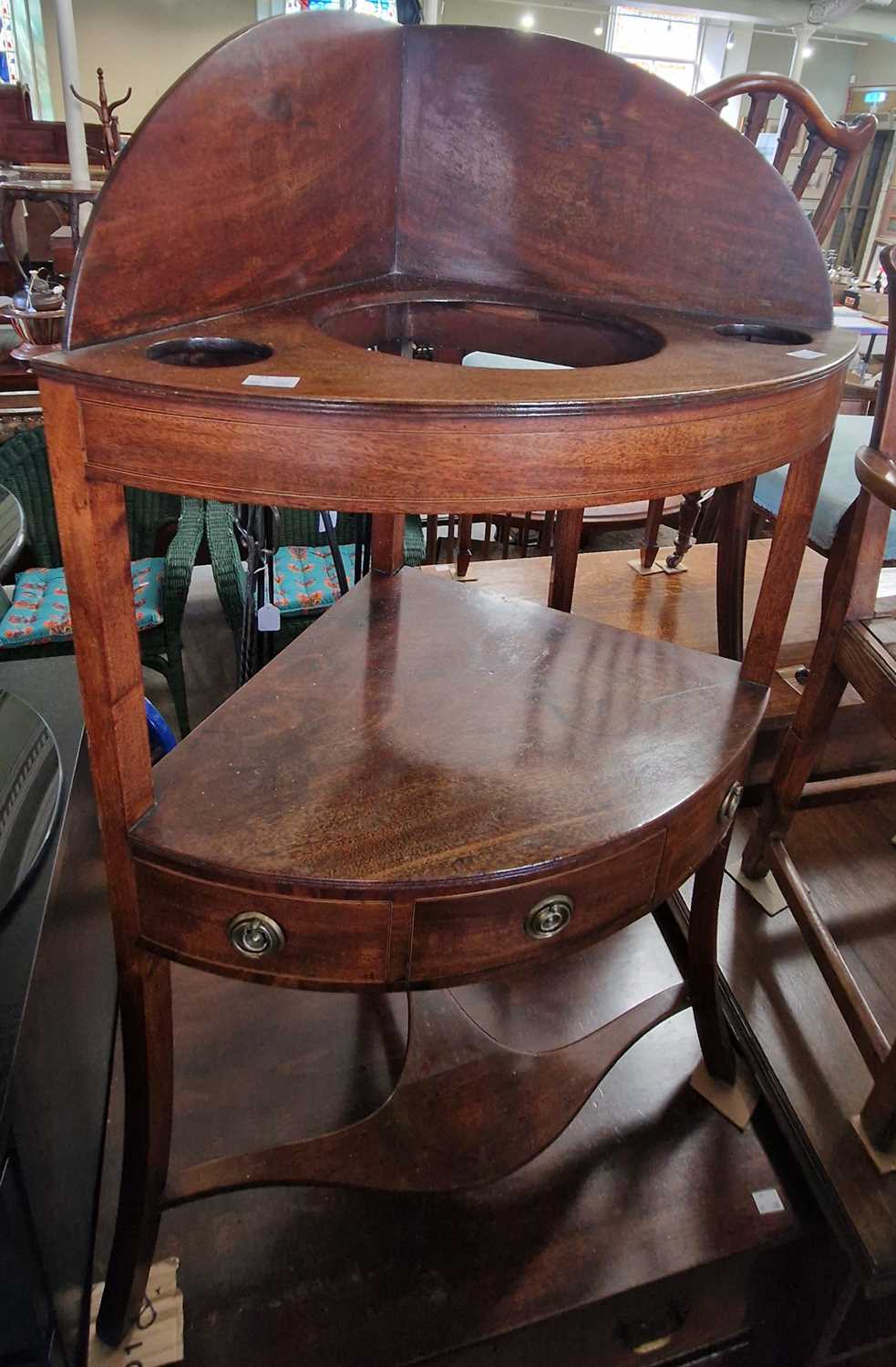 A 19th century mahogany and boxwood lined corner washstand, fitted with one small drawer, 59cm