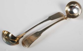 A near pair of 19th century silver sauce ladles, both Glasgow, one 1820 makers mark T.F, the other