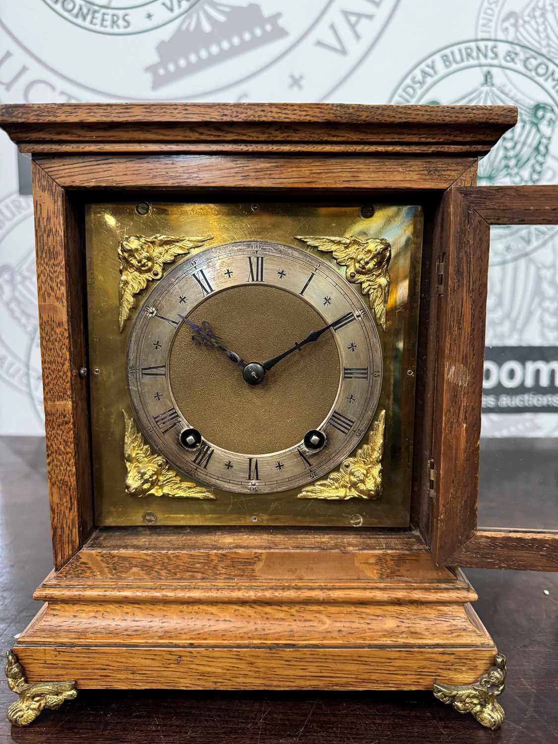 A late 19th / early 20th century oak cased table/ bracket clock, the case with brass carry handle, - Image 2 of 3