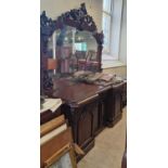 A Victorian mahogany mirror-back sideboard, the crest inscribed 'Perrit Qui Male Facit', 120cm