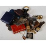 A bag of assorted wristwatches, coinage, costume jewellery, vintage cargo card golf game, Swiza