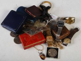 A bag of assorted wristwatches, coinage, costume jewellery, vintage cargo card golf game, Swiza