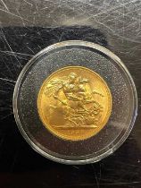 A 1958 Elizabeth II gold sovereign.