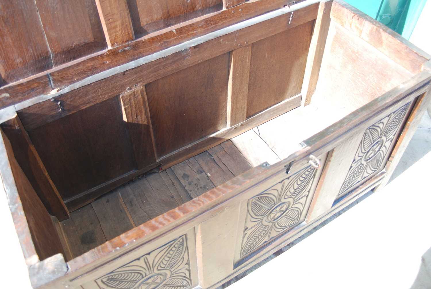 A George III oak coffer, the triple panel hinged cover over a triple panel front carved with three - Image 6 of 7