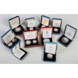Ten assorted Royal Mint cased silver proof coins, each with certificate of authenticity.