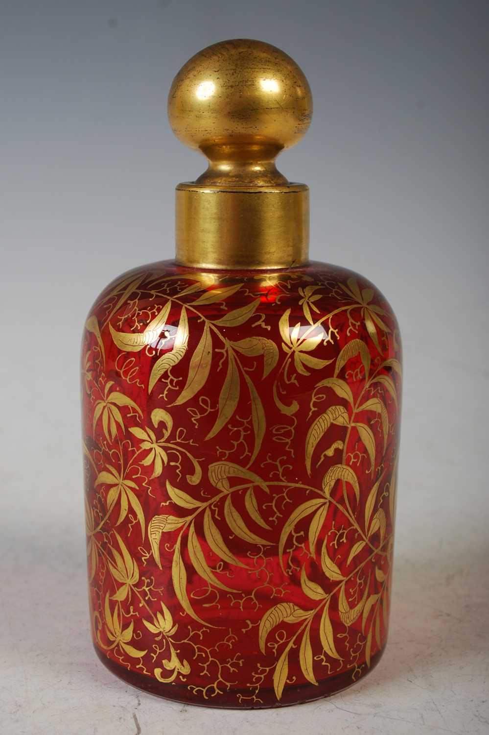 A late 19th century bohemian ruby glass and white overlaid glass toilet bottle and stopper, the - Image 2 of 2