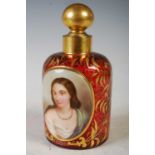 A late 19th century bohemian ruby glass and white overlaid glass toilet bottle and stopper, the