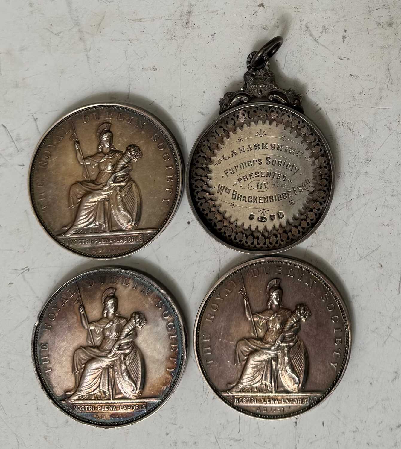 Three Edwardian Royal Dublin Society white metal medallions of equine interest, together with a - Image 2 of 2