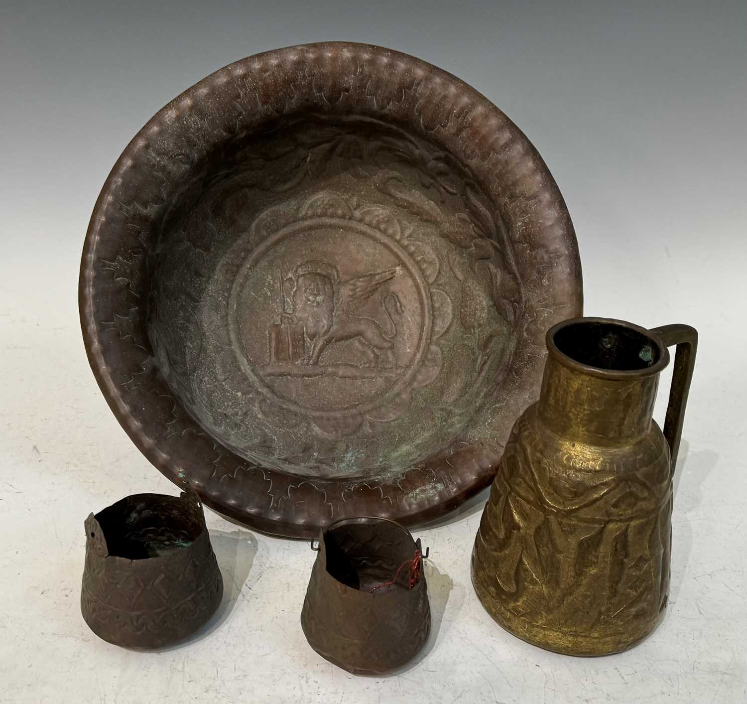 A collection of antique and later brass and copper wares to include a circular embossed wall - Image 2 of 2