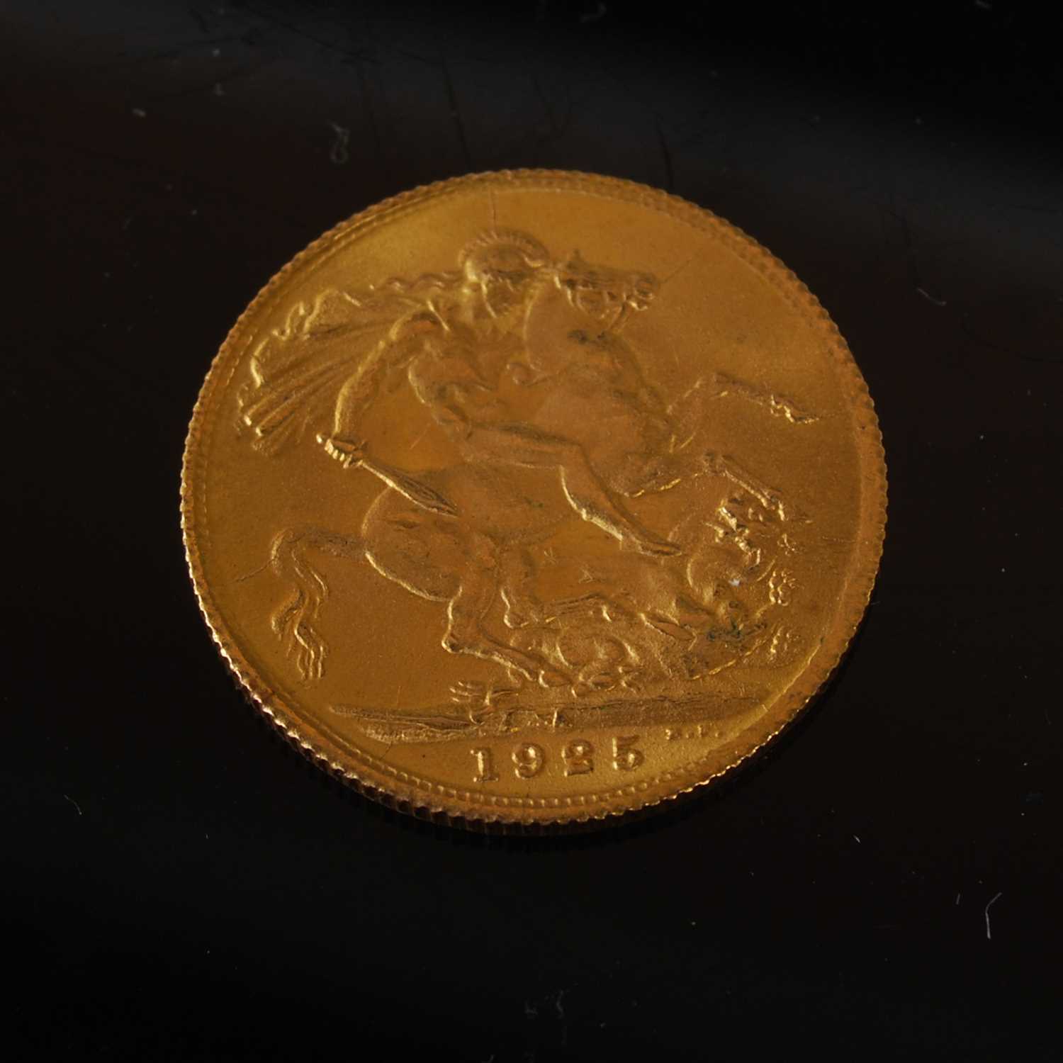A George V gold sovereign dated 1925.