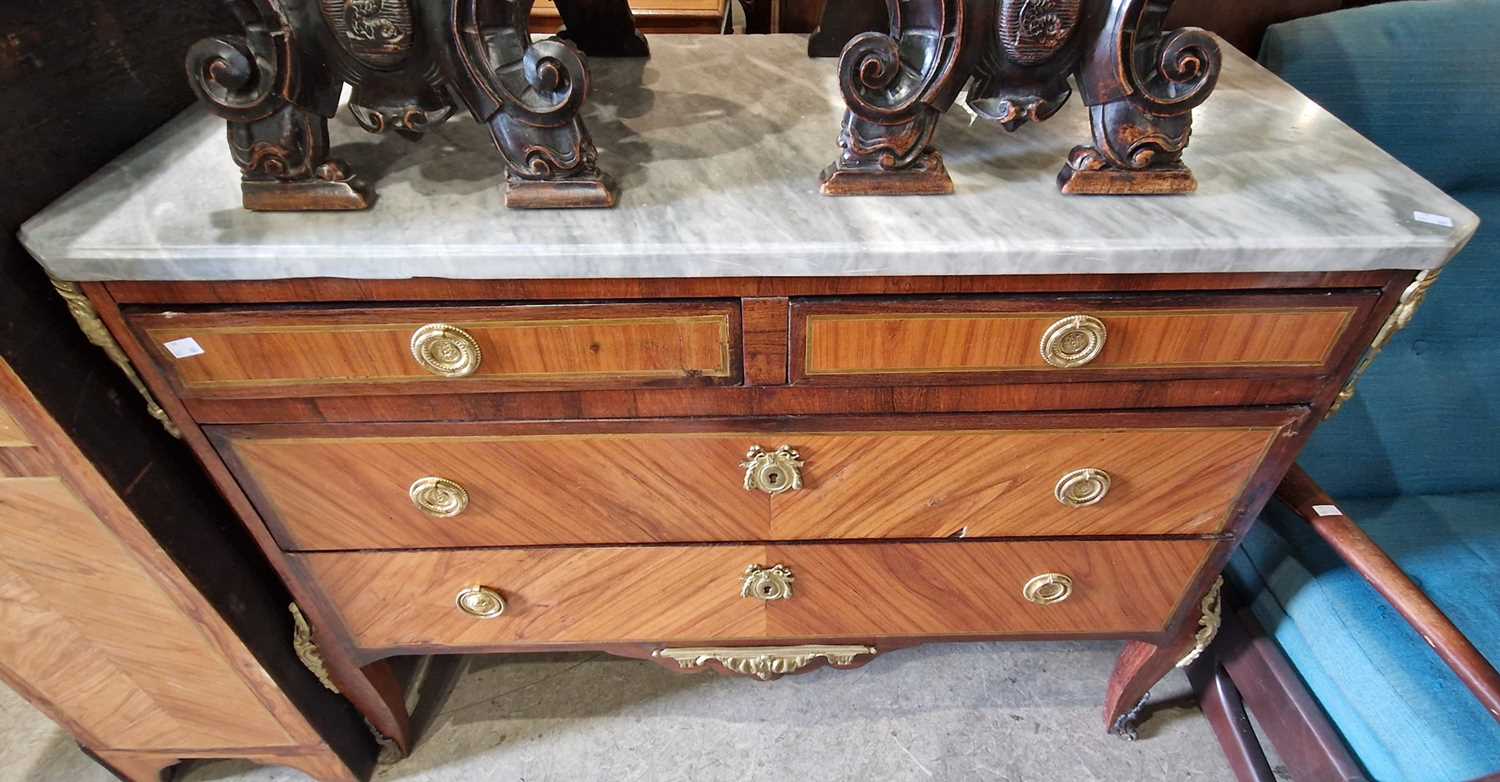 A late 19th century French Transitional style kingwood and gilt metal mounted commode, the mottled