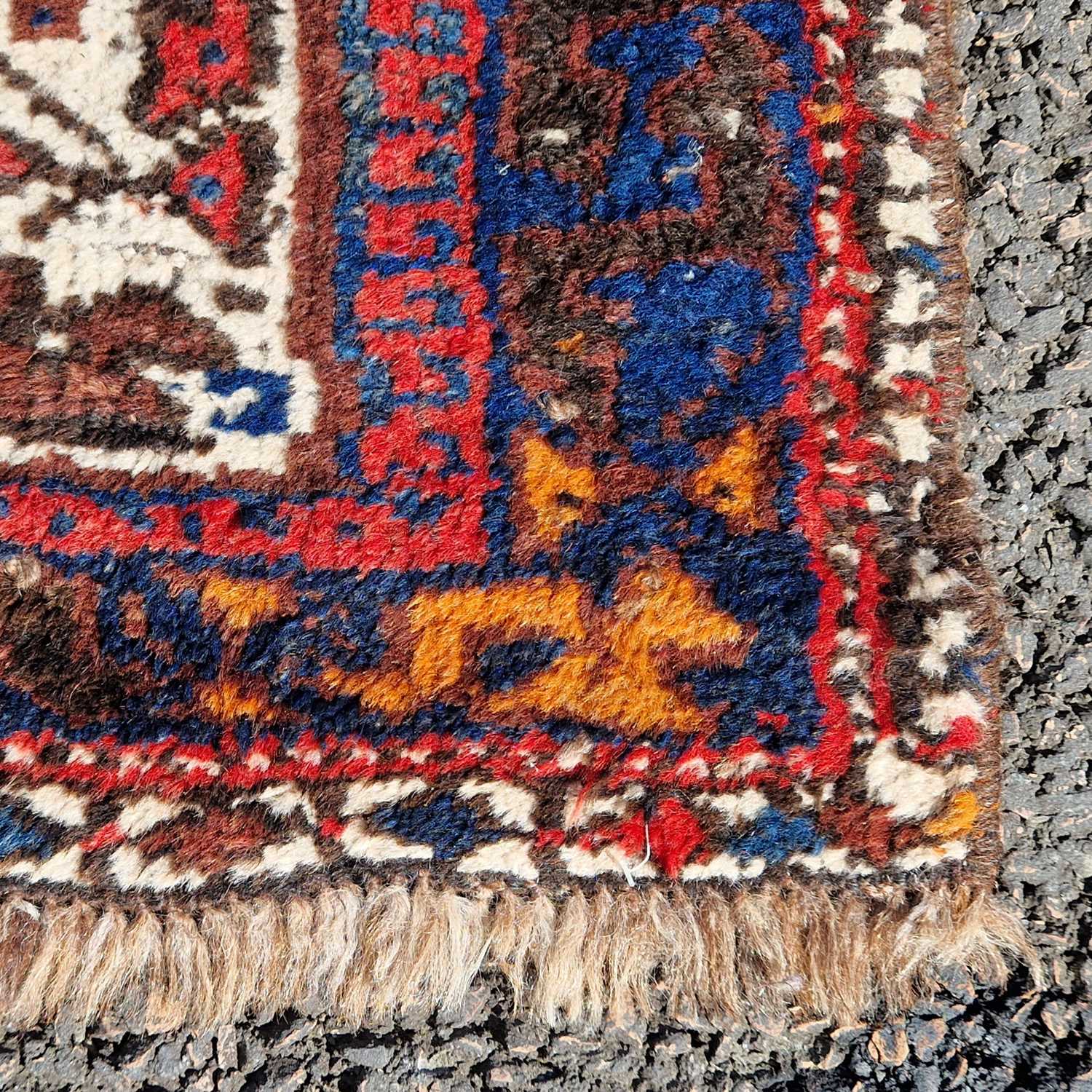 A Persian rug, 20th century, the rectangular field centered with three blue ground lozenge shaped - Image 3 of 5