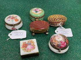 A group of six assorted gilt metal mounted pill/trinket boxes comprising, four continental porcelain