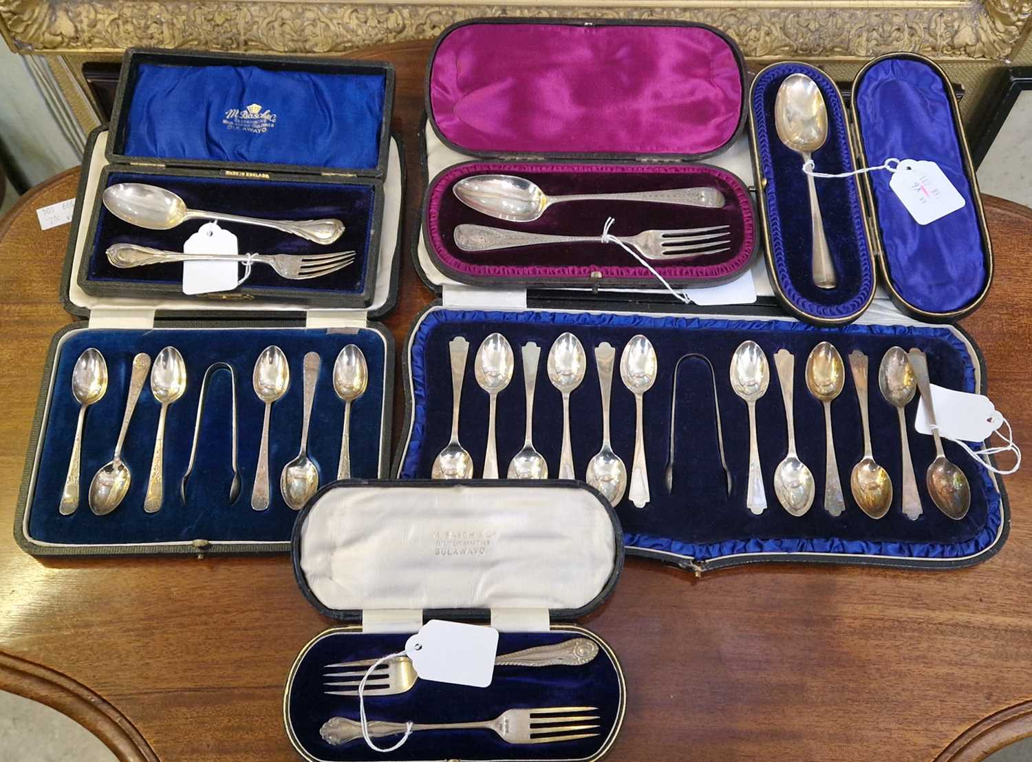 Six cased sets of assorted silver flatware to include cased set of twelve teaspoons and tongs, cased