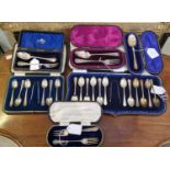 Six cased sets of assorted silver flatware to include cased set of twelve teaspoons and tongs, cased