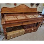 A 19th century oak console table/sideboard, the upright back with open shelf over three frieze