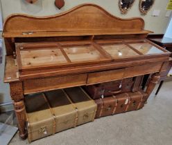 A 19th century oak console table/sideboard, the upright back with open shelf over three frieze