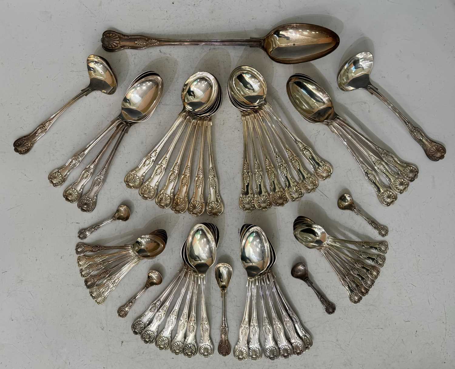 A collection of EPNS Kings pattern flatware, together with a Kings pattern serving spoon.