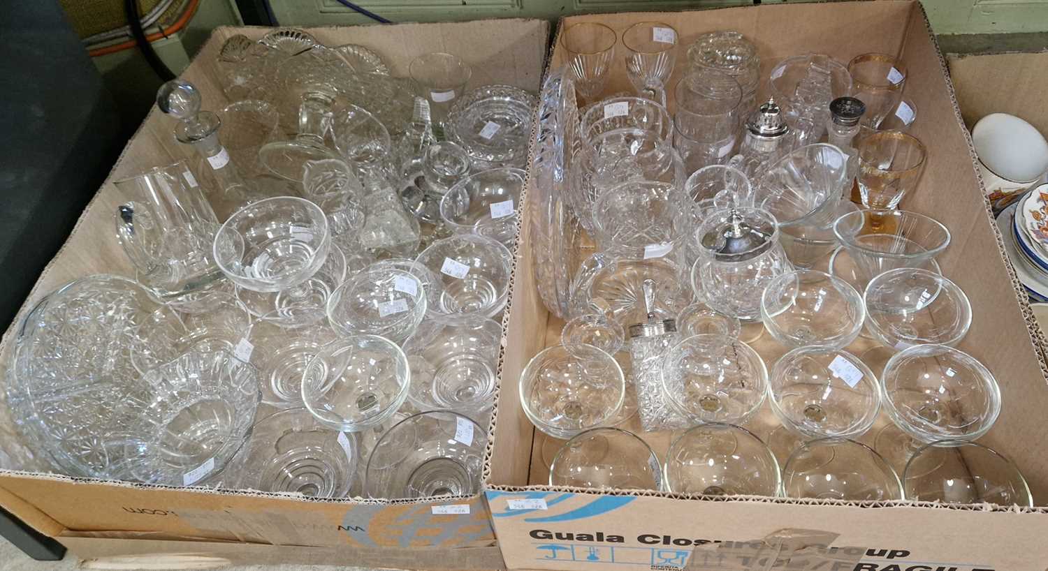 Two boxes of assorted glassware.